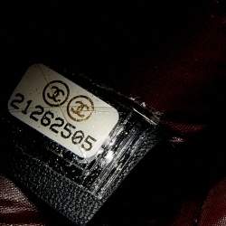 Pre Owned Chanel Black Quilted Leather O Case Clutch