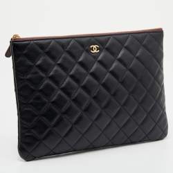 Pre Owned Chanel Black Quilted Leather O Case Clutch