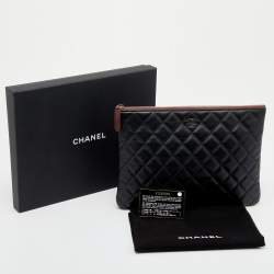 Pre Owned Chanel Black Quilted Leather O Case Clutch