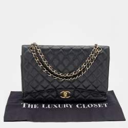 Pre Owned حقيبة شانيل ماكسي كلاسيك جلد كافيار مبطن أسود بقلاب مزدوج