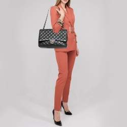 Pre Owned Chanel Black Quilted Caviar Leather Maxi Classic Single Flap Bag