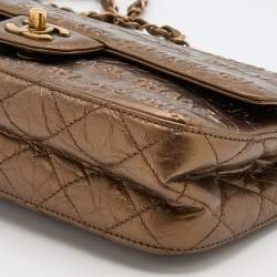 Pre Owned Chanel Metallic Bronze Leather Logo Embossed Flap Bag