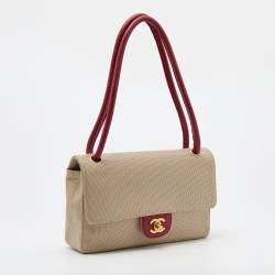 Pre Owned Chanel Beige Perforated Leather Vintage Flap Bag