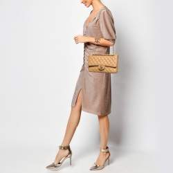 Pre Owned Chanel Beige Quilted Caviar Leather Medium Classic Double Flap Bag