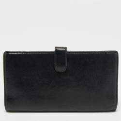 Chanel Black Camellia Embossed Leather Flap Wallet
