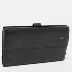 Chanel Black Camellia Embossed Leather Flap Wallet