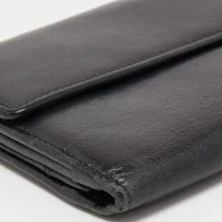Chanel Black Camellia Embossed Leather Flap Wallet