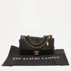 Pre Owned Chanel Black Chevron Leather Medallion Charm Flap Bag