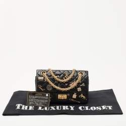 Pre Owned Chanel Black Quilted Aged Leather Lucky Charms Reissue 2.55 Classic 224 Flap Bag