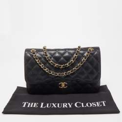 Pre Owned Chanel Black Quilted Caviar Leather Jumbo Classic Double Flap Bag