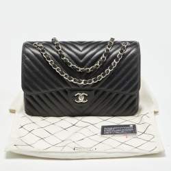 Pre Owned Chanel Black Chevron Quilted Caviar Leather Jumbo Classic Double Flap Bag