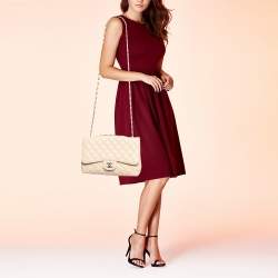 Pre Owned Chanel Beige Quilted Caviar Leather Jumbo Classic Single Flap Bag