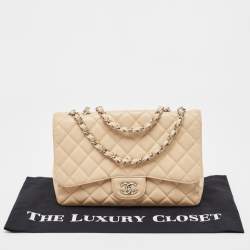 Pre Owned Chanel Beige Quilted Caviar Leather Jumbo Classic Single Flap Bag