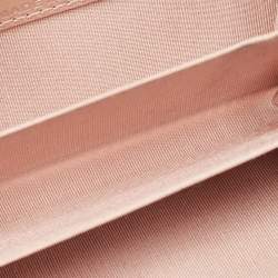 Chanel Pink Camellia Embossed Leather Zip Around Coin Purse
