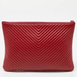 Pre Owned Chanel Red Chevron Quilted Caviar Leather Medium O'Case Pouch