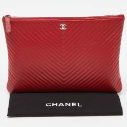 Pre Owned Chanel Red Chevron Quilted Caviar Leather Medium O'Case Pouch
