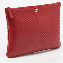 Pre Owned Chanel Red Chevron Quilted Caviar Leather Medium O'Case Pouch
