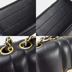 Chanel Black Vertical Quilted Caviar Flap Bag