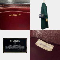 Chanel Black Vertical Quilted Caviar Flap Bag