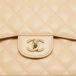 Pre Owned Chanel Light Beige Quilted Caviar Leather Jumbo Classic Double Flap Bag