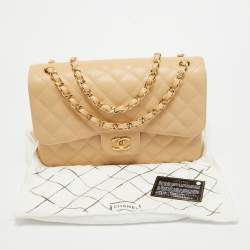 Pre Owned Chanel Beige Quilted Caviar Leather Jumbo Classic Double Flap Bag