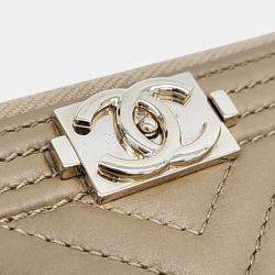 Pre Owned Chanel Brown Leather Chevron Boy Medium Clutch Bag