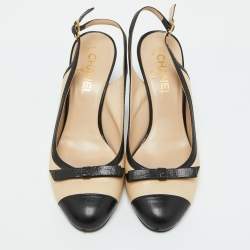 Pre Owned Chanel Beige/Black Leather Cap Toe CC Bow Slingback Pumps Size 39.5