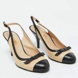 Pre Owned Chanel Beige/Black Leather Cap Toe CC Bow Slingback Pumps Size 39.5