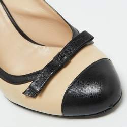 Pre Owned Chanel Beige/Black Leather Cap Toe CC Bow Slingback Pumps Size 39.5