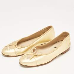 Pre Owned Chanel Gold Leather Cap Toe CC Bow Ballet Flats Size 35.5