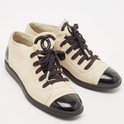 Pre Owned Chanel Black/Cream Leather and Patent Cap Toe Lace Up Sneakers Size 38