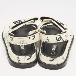 مملوكة مسبقًا Chanel White/Black Printed Leather CC Dad Velcro Flat Sandals Size 38