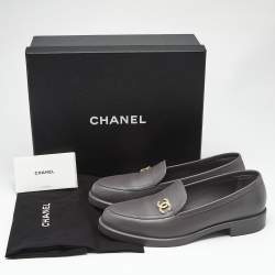 Pre Owned Chanel Grey Leather CC Slip On Loafers Size 40.5