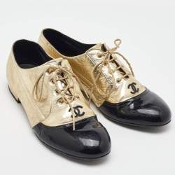 Pre Owned Chanel Gold/Black Leather and Patent Leather CC Lace Up Oxfords Size 38.5