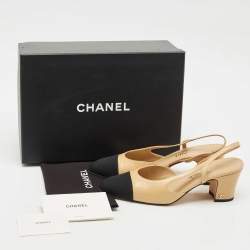 Pre Owned Chanel Beige/Black Canvas and Leather CC Cap Toe Slingback Pumps Size 38.5
