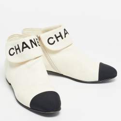 Pre Owned Chanel Ivory/Black Leather Logo Cap Toe Ankle Length Boots Size 38.5