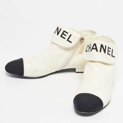 Pre Owned Chanel Ivory/Black Leather Logo Cap Toe Ankle Length Boots Size 38.5