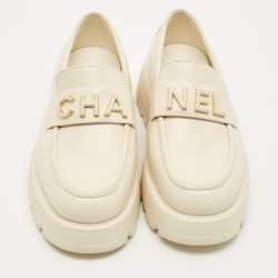 Pre Owned Chanel Cream Leather Logo Slip On Loafers Size 36.5