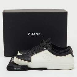 Pre Owned Chanel Black/White Leather and Rubber CC Cap Toe Lace Up Sneakers Size 39