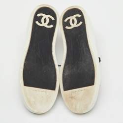 Pre Owned Chanel Black/White Leather and Rubber CC Cap Toe Lace Up Sneakers Size 39