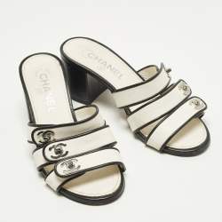 مملوكة مسبقًا صندل شانيل جلد أبيض/أسود بكعب CC مقاس 36