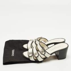 مملوكة مسبقًا صندل شانيل جلد أبيض/أسود بكعب CC مقاس 36