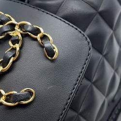 Pre Owned بوت قصير شانيل CC شعار جلد أسود مقاس 35