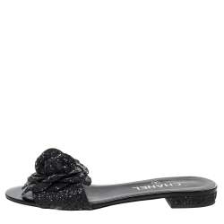Pre Owned Chanel Black Coarse Glitter Fabric Camellia Embellished CC Flat Slides Size 37.5