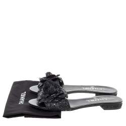 Pre Owned Chanel Black Coarse Glitter Fabric Camellia Embellished CC Flat Slides Size 37.5