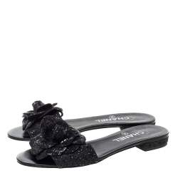Pre Owned Chanel Black Coarse Glitter Fabric Camellia Embellished CC Flat Slides Size 37.5