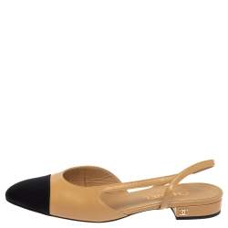 مملوكة مسبقًا Chanel Beige/Black Leather and Canvas CC Cap Toe Slingback Flat Sandals Size 38.5