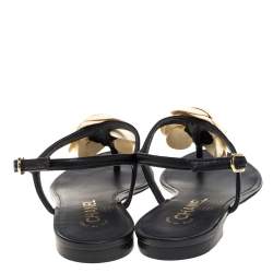 Pre Owned Chanel Black Leather And Cream Camellia CC Thong Sandals Size 36.5