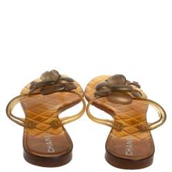 Pre Owned Chanel Gold Rubber Camellia CC Thong Flat Slides Size 39