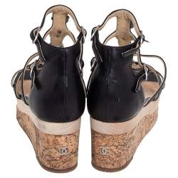 مملوكة مسبقًا Chanel Black Leather Camellia Strappy Cork Platform Sandals Size 38